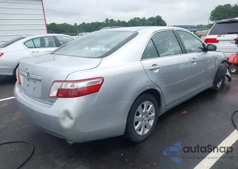 2007 Toyota Camry Hybrid z USA, uszkodzony, nr VIN JTNBB46KX73034471
